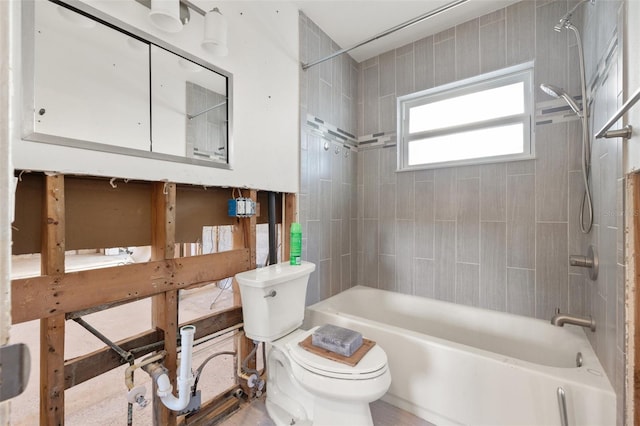 full bathroom with toilet and bathing tub / shower combination