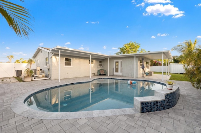 view of pool with a fenced backyard, a patio area, and a fenced in pool