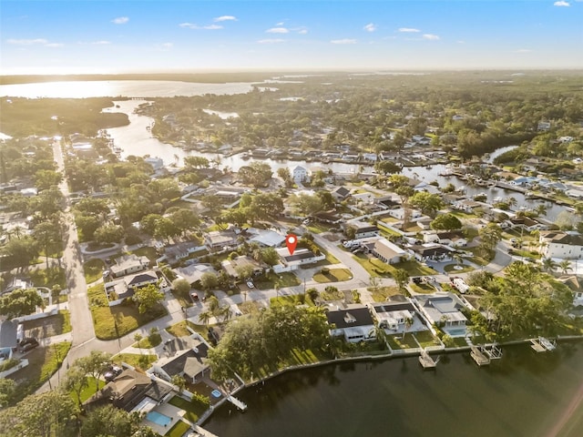 bird's eye view with a residential view and a water view