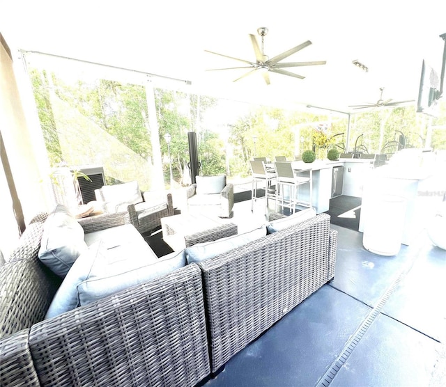 2332 Dekan Ln, Land O Lakes, FL 34639 - view of patio with outdoor dry bar, an outdoor living space, a ceiling fan, and visible vents