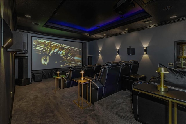 2332 Dekan Ln, Land O Lakes, FL 34639 - carpeted home theater featuring visible vents and a tray ceiling