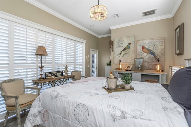 2332 Dekan Ln, Land O Lakes, FL 34639 - bedroom with a chandelier, visible vents, and crown molding