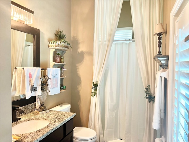 2332 Dekan Ln, Land O Lakes, FL 34639 - bathroom with toilet, vanity, and curtained shower