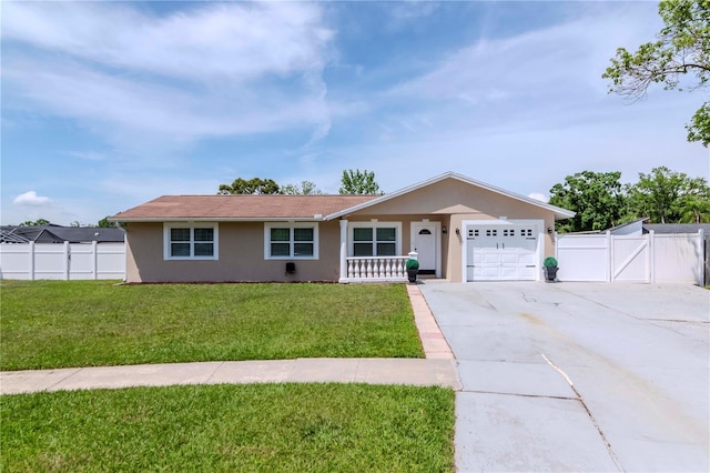 10705 Knollsway Ct, Tampa, FL 33625 - ranch-style home with concrete driveway, stucco siding, an attached garage, a front yard, and fence