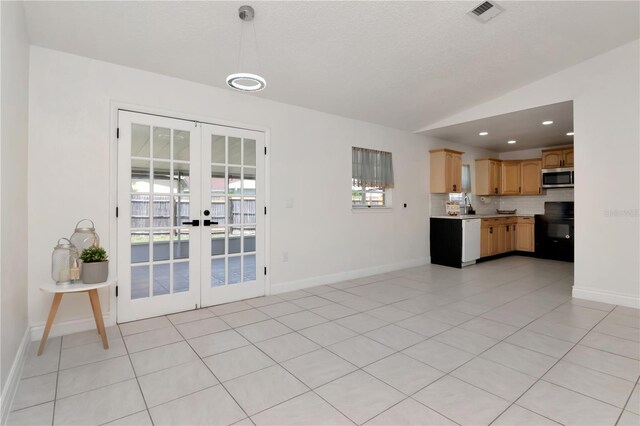 10705 Knollsway Ct, Tampa, FL 33625 - unfurnished living room with visible vents, recessed lighting, lofted ceiling, french doors, and baseboards