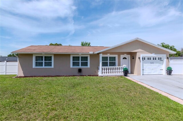 10705 Knollsway Ct, Tampa, FL 33625 - single story home with concrete driveway, stucco siding, an attached garage, a front yard, and fence