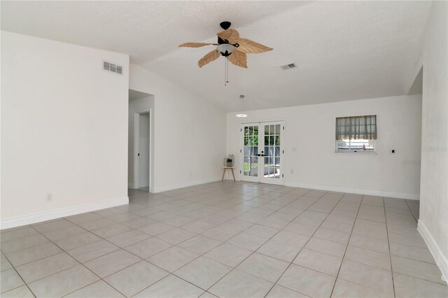10705 Knollsway Ct, Tampa, FL 33625 - unfurnished room featuring french doors, lofted ceiling, a ceiling fan, and visible vents