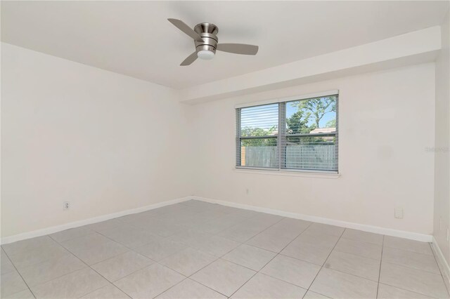 10705 Knollsway Ct, Tampa, FL 33625 - unfurnished room with light tile patterned floors, ceiling fan, and baseboards