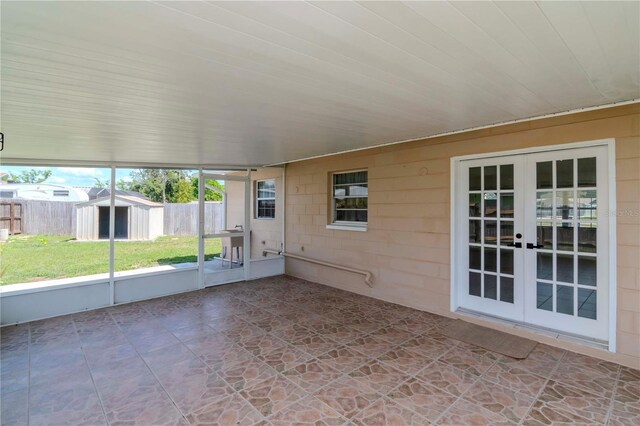 10705 Knollsway Ct, Tampa, FL 33625 - unfurnished sunroom featuring french doors