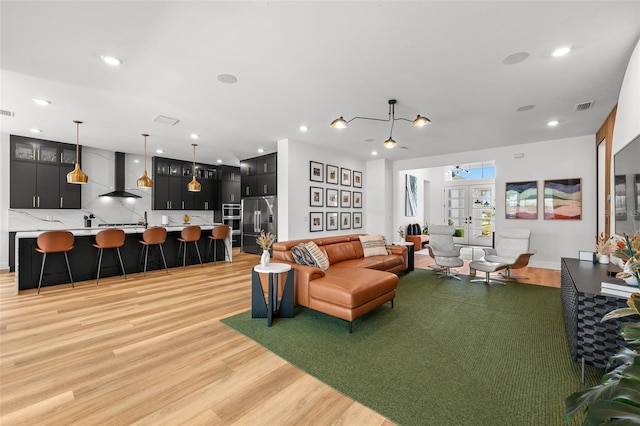 8720 Drummer Plank Dr, Wesley Chapel, FL 33545 - living room featuring visible vents, recessed lighting, and light wood-type flooring