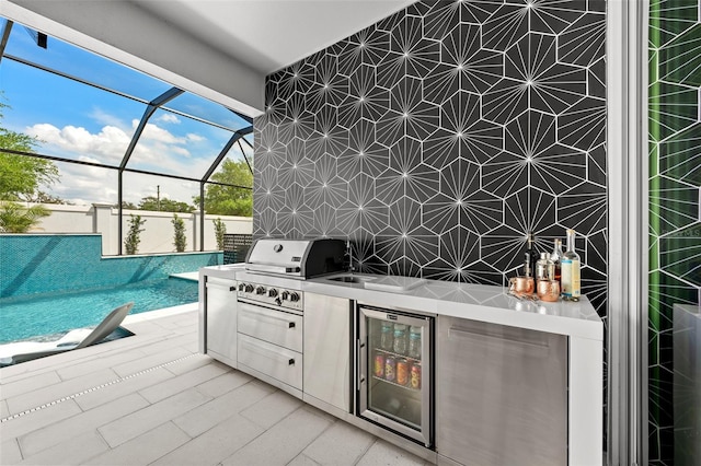 8720 Drummer Plank Dr, Wesley Chapel, FL 33545 - view of patio / terrace with wine cooler, exterior kitchen, a lanai, and an outdoor pool