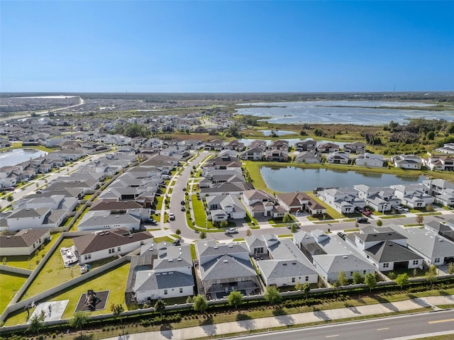 8720 Drummer Plank Dr, Wesley Chapel, FL 33545 - birds eye view of property featuring a water view and a residential view