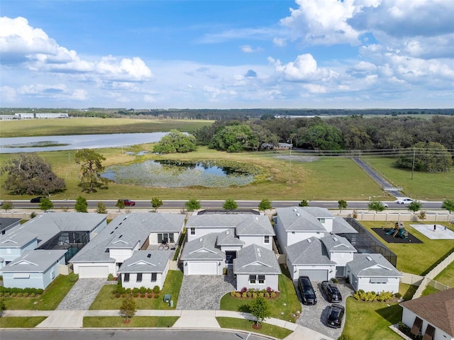 8720 Drummer Plank Dr, Wesley Chapel, FL 33545 - birds eye view of property with a water view and a residential view