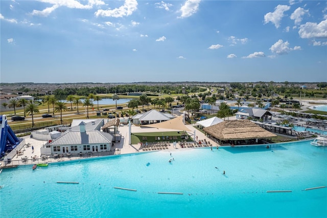 8720 Drummer Plank Dr, Wesley Chapel, FL 33545 - community pool with a water view and fence