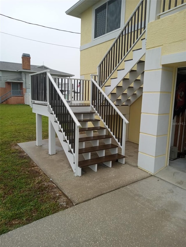 entrance to property with a yard