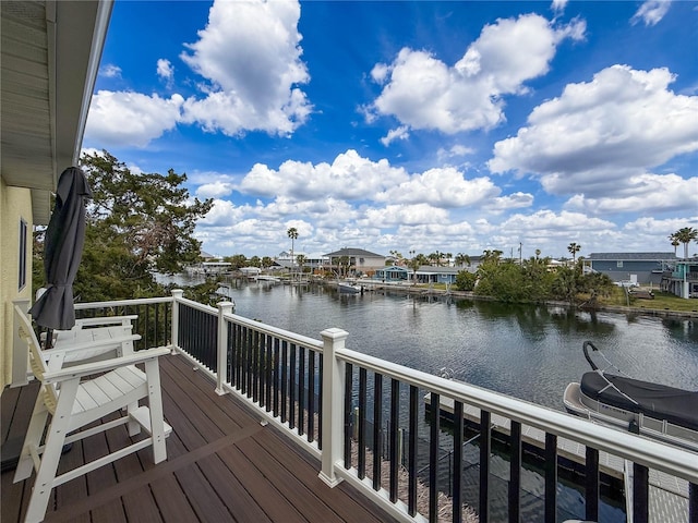 wooden terrace with a water view