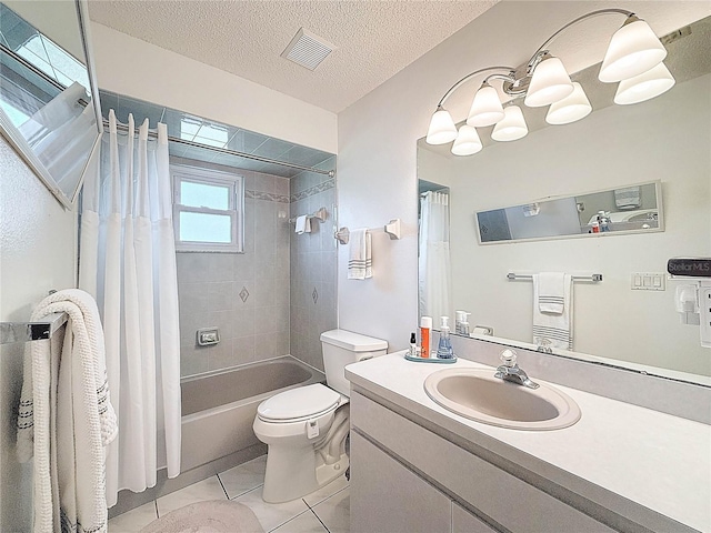 bathroom with toilet, tile patterned floors, vanity, shower / tub combo, and a textured ceiling