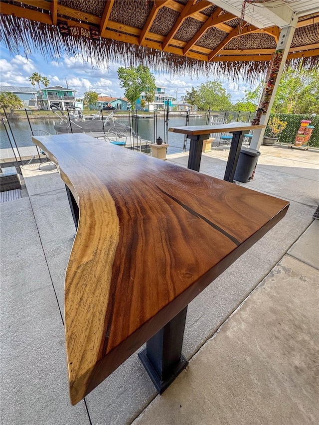 4116 Diaz Ct, Hernando Beach, FL 34607 - view of patio with a water view, a dock, boat lift, and a gazebo