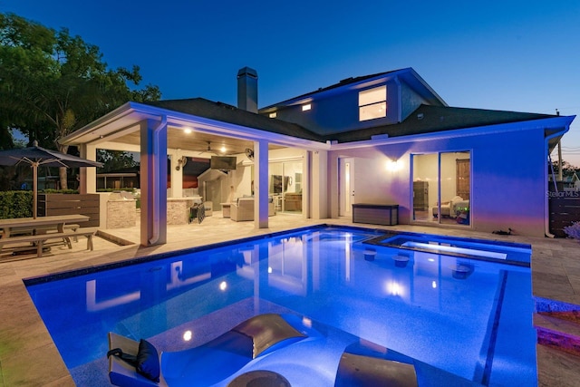 182 E Canal Dr, Palm Harbor, FL 34684 - view of swimming pool featuring a patio and a pool with connected hot tub