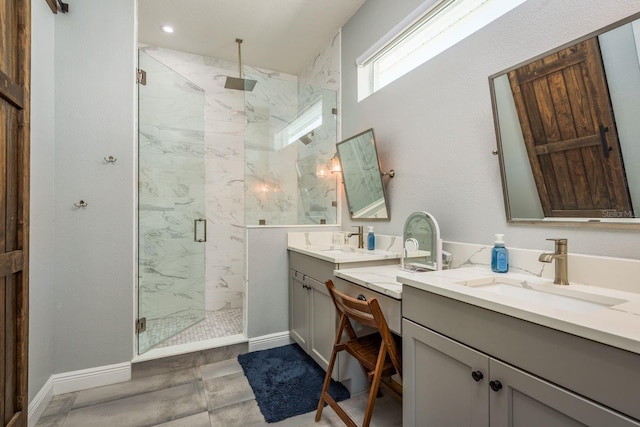 182 E Canal Dr, Palm Harbor, FL 34684 - full bath with a sink, two vanities, a marble finish shower, and baseboards
