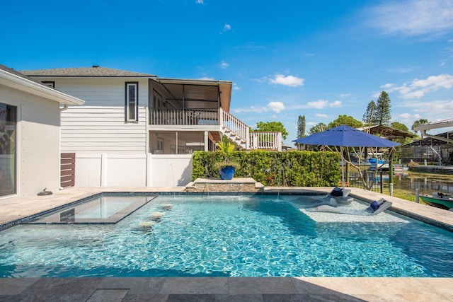 182 E Canal Dr, Palm Harbor, FL 34684 - view of swimming pool featuring a fenced in pool, stairway, fence, and a jacuzzi