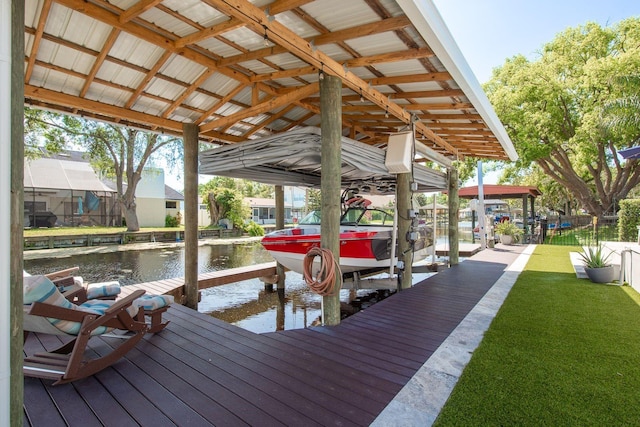 182 E Canal Dr, Palm Harbor, FL 34684 - dock area featuring a water view, fence, a yard, and boat lift