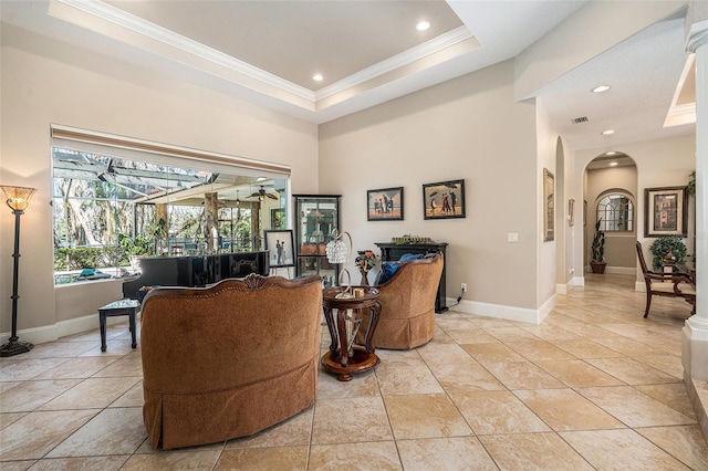 3607 Berger Rd, Lutz, FL 33548 - living area featuring arched walkways, crown molding, recessed lighting, and a sunroom