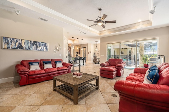3607 Berger Rd, Lutz, FL 33548 - living room featuring ornamental molding, a tray ceiling, a ceiling fan, light tile patterned floors, and recessed lighting
