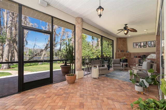 3607 Berger Rd, Lutz, FL 33548 - sunroom featuring ceiling fan