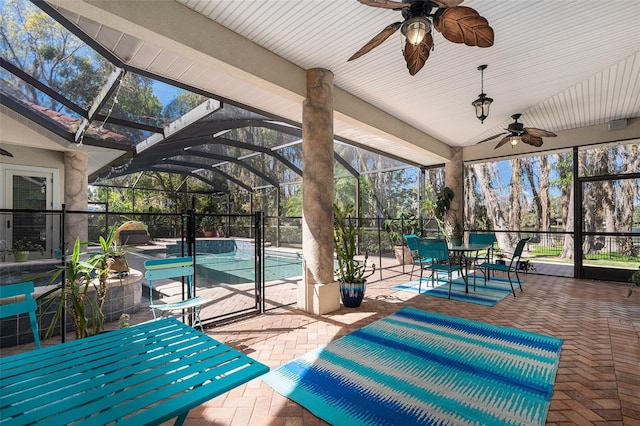 3607 Berger Rd, Lutz, FL 33548 - unfurnished sunroom with a ceiling fan and outdoor dining area