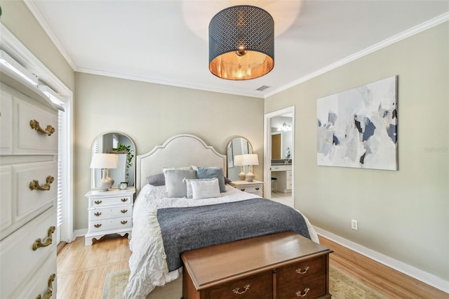 bedroom with light wood-style floors, ornamental molding, baseboards, and visible vents
