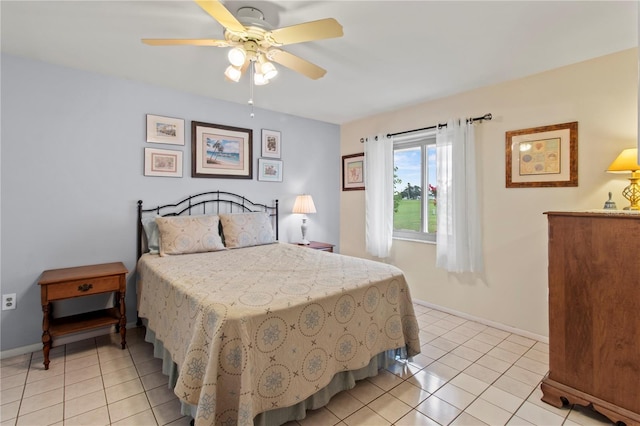 733 Ojai Ave, Sun City Center, FL 33573 - bedroom featuring light tile patterned floors and a ceiling fan