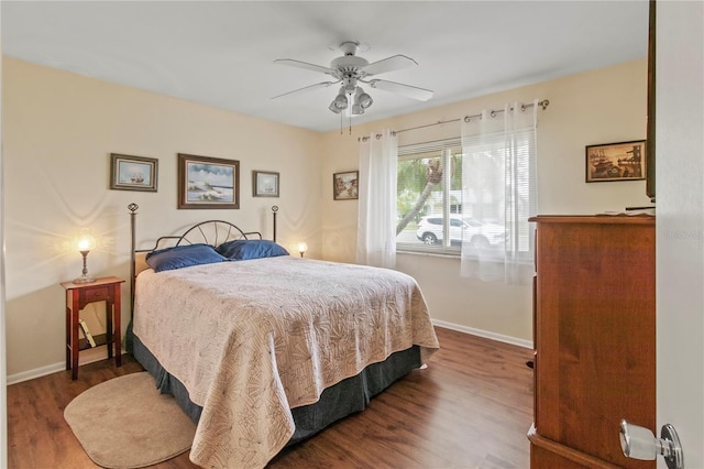 733 Ojai Ave, Sun City Center, FL 33573 - bedroom featuring wood finished floors and a ceiling fan