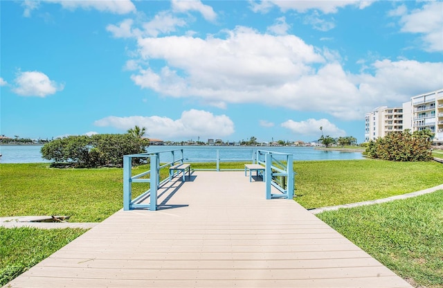 7872 Sailboat Key Blvd S Unit 404, South Pasadena, FL 33707 - dock with a water view and a lawn