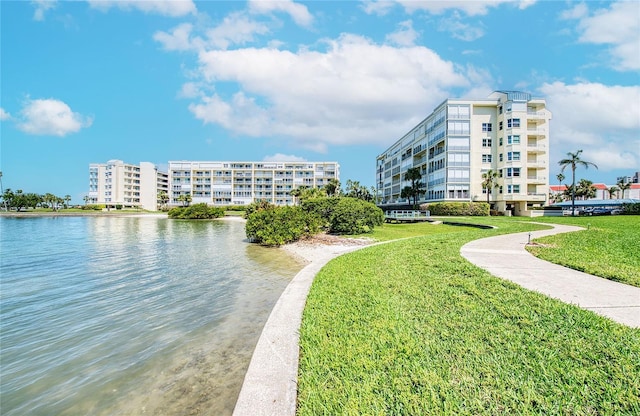 7872 Sailboat Key Blvd S Unit 404, South Pasadena, FL 33707 - view of property's community with a yard and a water view