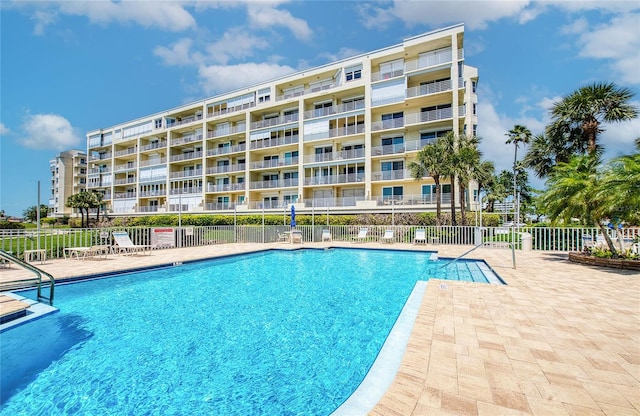 7872 Sailboat Key Blvd S Unit 404, South Pasadena, FL 33707 - community pool with fence and a patio