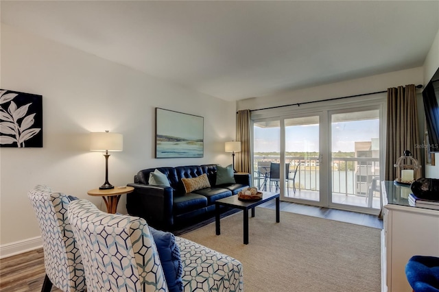 19925 Gulf Blvd Unit 502, Indian Shores, FL 33785 - living room with baseboards and wood finished floors