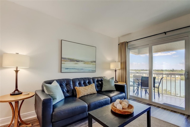 19925 Gulf Blvd Unit 502, Indian Shores, FL 33785 - living area featuring baseboards and wood finished floors