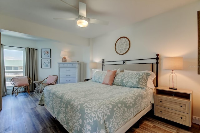 19925 Gulf Blvd Unit 502, Indian Shores, FL 33785 - bedroom featuring dark wood-style flooring and ceiling fan