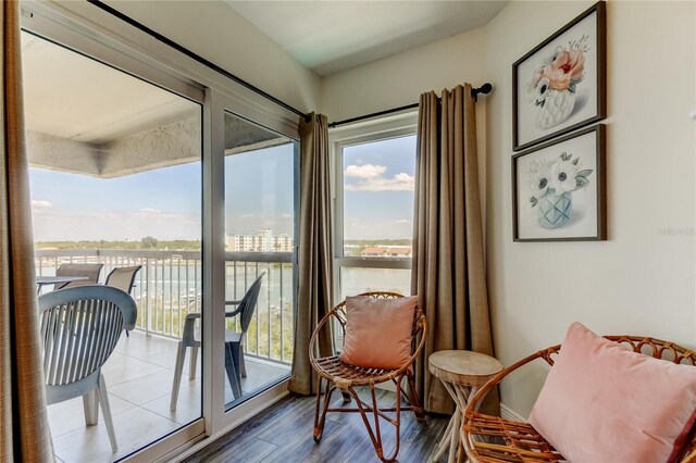 19925 Gulf Blvd Unit 502, Indian Shores, FL 33785 - sitting room with baseboards and wood finished floors