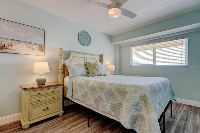 19925 Gulf Blvd Unit 502, Indian Shores, FL 33785 - bedroom featuring baseboards, wood finished floors, and ceiling fan