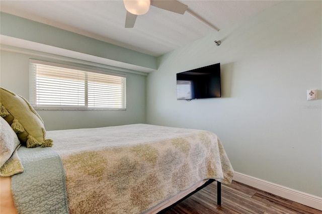 19925 Gulf Blvd Unit 502, Indian Shores, FL 33785 - bedroom featuring baseboards, ceiling fan, and wood finished floors