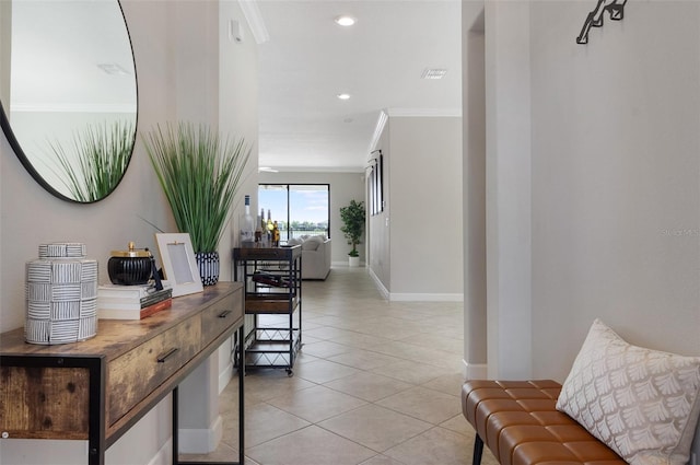 10008 Celtic Ash Dr, Ruskin, FL 33573 - corridor featuring light tile patterned floors, ornamental molding, and recessed lighting