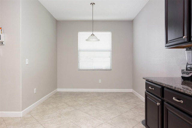 10008 Celtic Ash Dr, Ruskin, FL 33573 - dining room with light tile patterned flooring and baseboards
