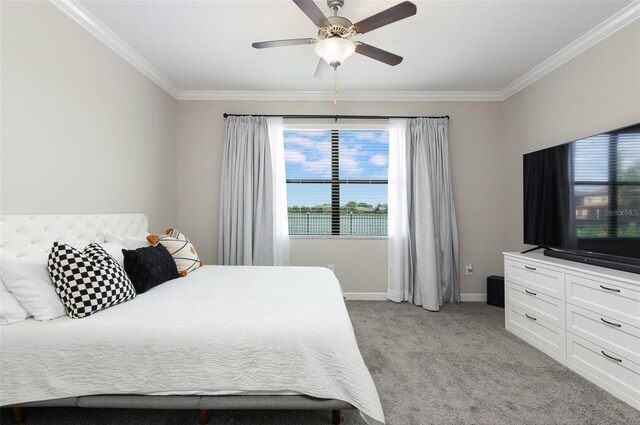 10008 Celtic Ash Dr, Ruskin, FL 33573 - bedroom featuring ornamental molding, light colored carpet, multiple windows, and ceiling fan