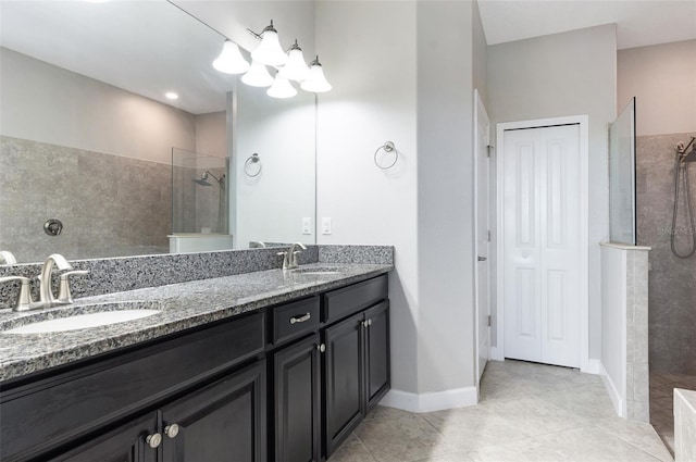 10008 Celtic Ash Dr, Ruskin, FL 33573 - full bath with walk in shower, double vanity, a chandelier, and tile patterned flooring