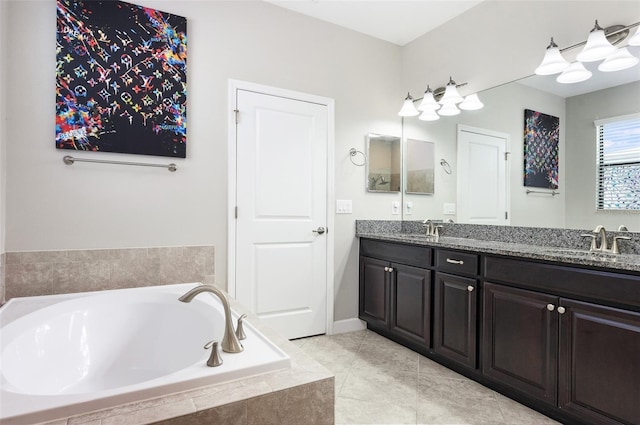 10008 Celtic Ash Dr, Ruskin, FL 33573 - full bathroom with double vanity, a bath, and tile patterned floors