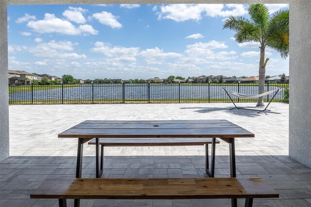 10008 Celtic Ash Dr, Ruskin, FL 33573 - view of community featuring a residential view and a patio area