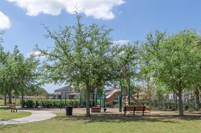 10008 Celtic Ash Dr, Ruskin, FL 33573 - community jungle gym with a yard