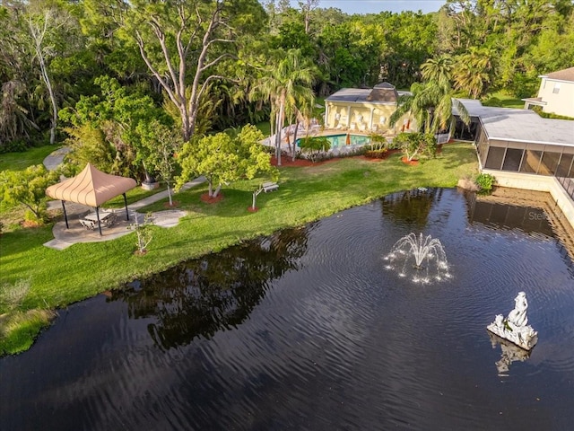 11260 Kapok Grand Cir, Madeira Beach, FL 33708 - drone / aerial view featuring a water view